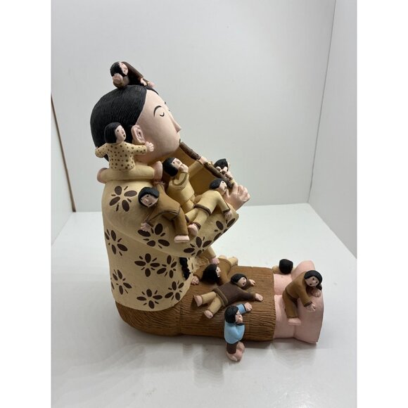 Clay Storyteller Figurine With Multicolored Children & Flute Design - Picture 11 of 12